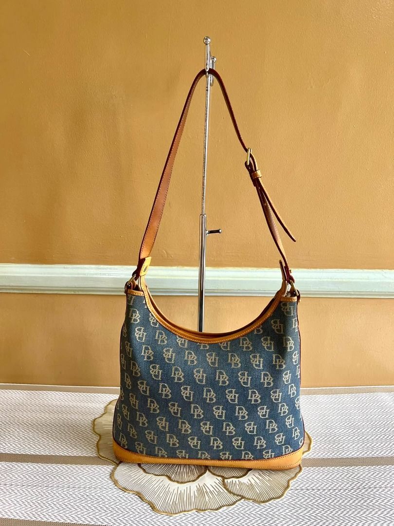 Dooney & Bourke Shoulder Bag (Category: Shoulder Bags) located in Quezon City. Submitted by bellafashion08 (Listing ID 1468432611, Image 1). Description: Dimension: - Height =8 in. - Length = 11 in. * From U.S * Nice in actual .