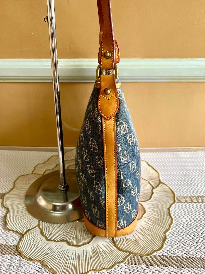 Dooney & Bourke Shoulder Bag (Category: Shoulder Bags) located in Quezon City. Submitted by bellafashion08 (Listing ID 1468432611, Image 2). Description: Dimension: - Height =8 in. - Length = 11 in. * From U.S * Nice in actual .
