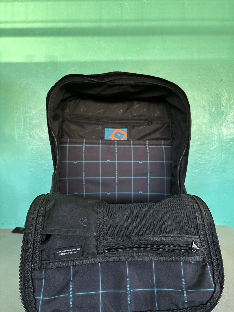 DOUGHNUT MACAROON GAMESCAPE SERIES (original) (Category: Backpacks) located in Quezon City. Submitted by gamitnirod (Listing ID 1468356459, Image 3). Description: -Color: Black (Deep/neat black) -Size: 17in x 11.5in x 5 -No issue, no damage -Perfect for daily use or light travel -With padded laptop compartment up to 14’ -2 inner (with garter) and 2 outer side pockets for umbrella or tumbler -Multiple inner mini pockets -1 secured pocket behind fo