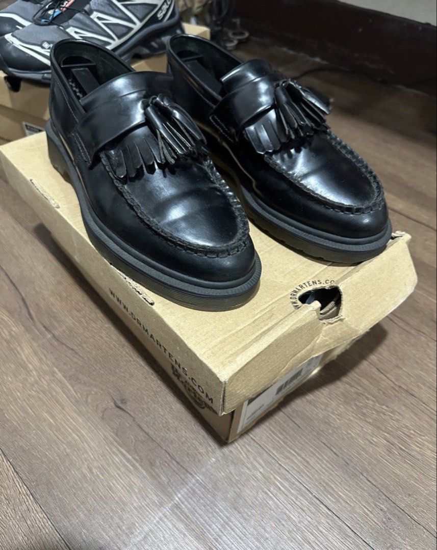 Dr. Martens Adrian Loafers (Category: Casual Shoes) located in Subic. Submitted by declutterbyshit (Listing ID 1468499923, Image 2). Description: - Brand: Dr. Martens - Style: Adrian Tassel Loafers - Color: Black Polished Smooth Leather - Size: UK 6 / US 7 / EU 39 fits to 8 (sized down) authentic - Condition: Excellent, soles have hardly any wear - Inclusions: Original shoe box included.