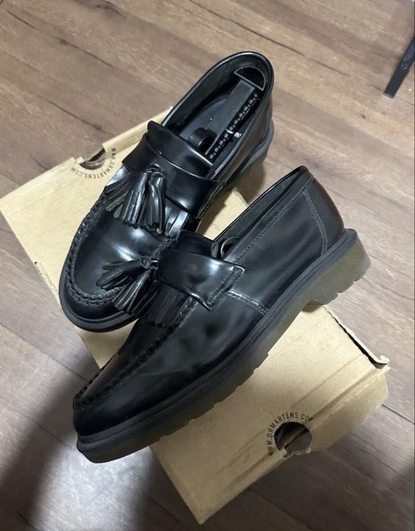 Dr. Martens Adrian Loafers (Category: Casual Shoes) located in Subic. Submitted by declutterbyshit (Listing ID 1468499923, Image 1). Description: - Brand: Dr. Martens - Style: Adrian Tassel Loafers - Color: Black Polished Smooth Leather - Size: UK 6 / US 7 / EU 39 fits to 8 (sized down) authentic - Condition: Excellent, soles have hardly any wear - Inclusions: Original shoe box included.