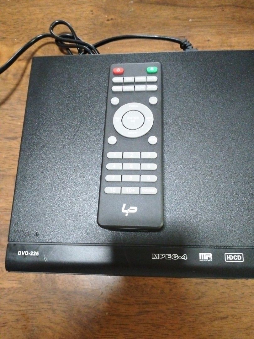 DVD-225 MPEG-4 DVD Player/Digital CD Player with Remote Control (Category: Blu-Ray & Media Players) located in Quezon City. Submitted by Botsok (Listing ID 1468353253, Image 3). Description: - Model: DVD-225 MPEG-4 Player in sleek black casing - Media Support: Plays standard discs, HDCD, and Kodak picture CDs - Can be used as Digital CD Player to connect to Digital Input (COAX) of your Amplifier or Digital to Analog Converter (DAC) thru its COAX 