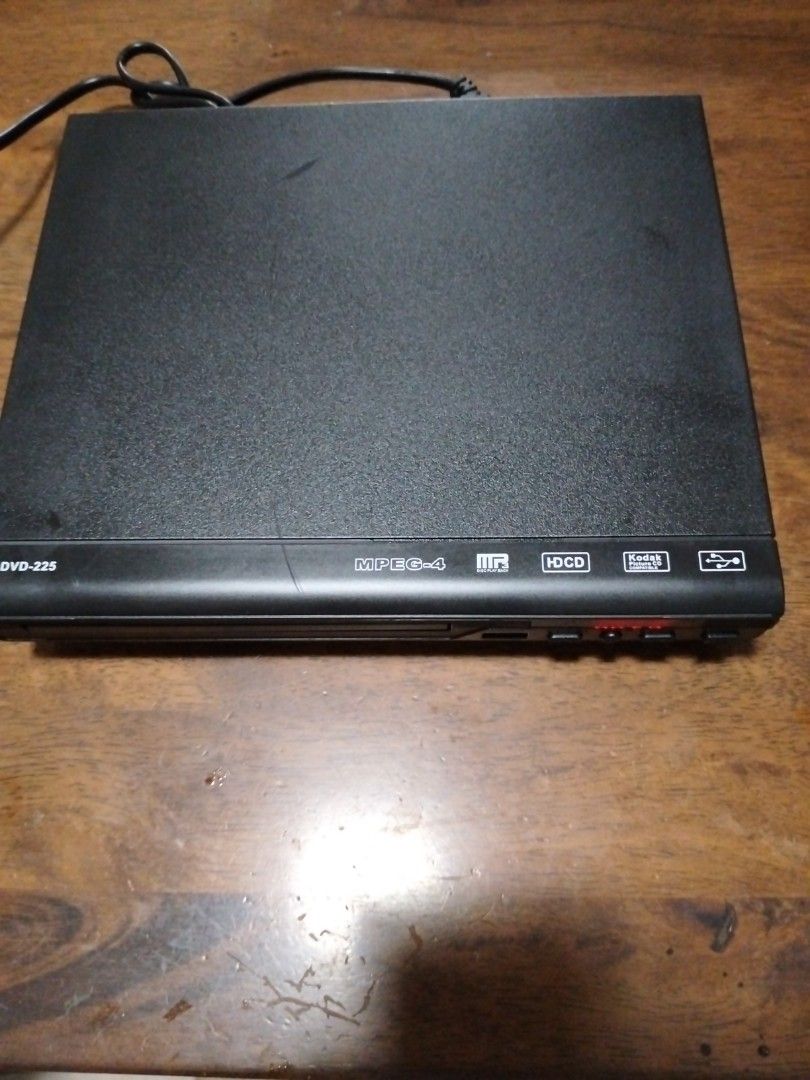 DVD-225 MPEG-4 DVD Player/Digital CD Player with Remote Control (Category: Blu-Ray & Media Players) located in Quezon City. Submitted by Botsok (Listing ID 1468353253, Image 2). Description: - Model: DVD-225 MPEG-4 Player in sleek black casing - Media Support: Plays standard discs, HDCD, and Kodak picture CDs - Can be used as Digital CD Player to connect to Digital Input (COAX) of your Amplifier or Digital to Analog Converter (DAC) thru its COAX 