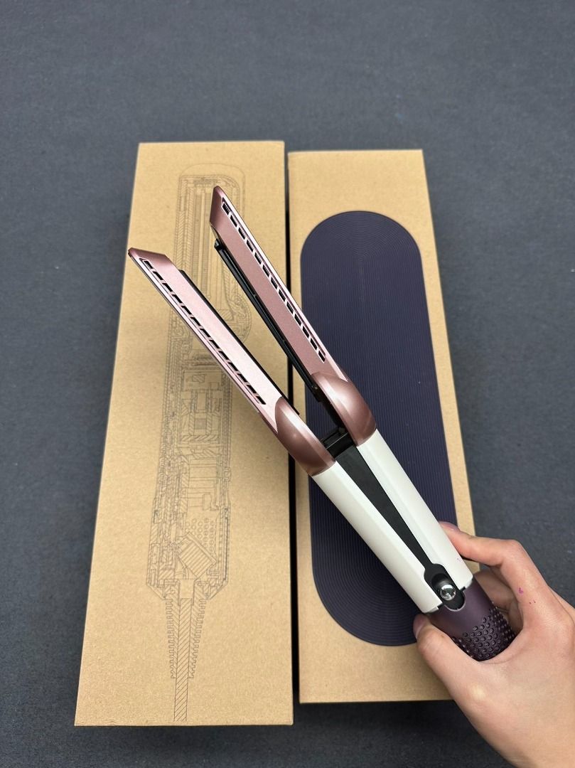 Dyson Airstrait Straightener Ceramic Pop HT01 (Category: Hair) located in Las Pinas. Submitted by raremountain-e7fc4f (Listing ID 1468351625, Image 3). Description: - Authentic Dyson Airstrait in Strawberry Bronze & Blush Pink - Wet-to-dry styling powered by air (no hot plates) - Zero heat damage technology for healthy hair - Tested and in perfect working condition - Includes original cardboard box and matching storage mat - Grab this amazing dea