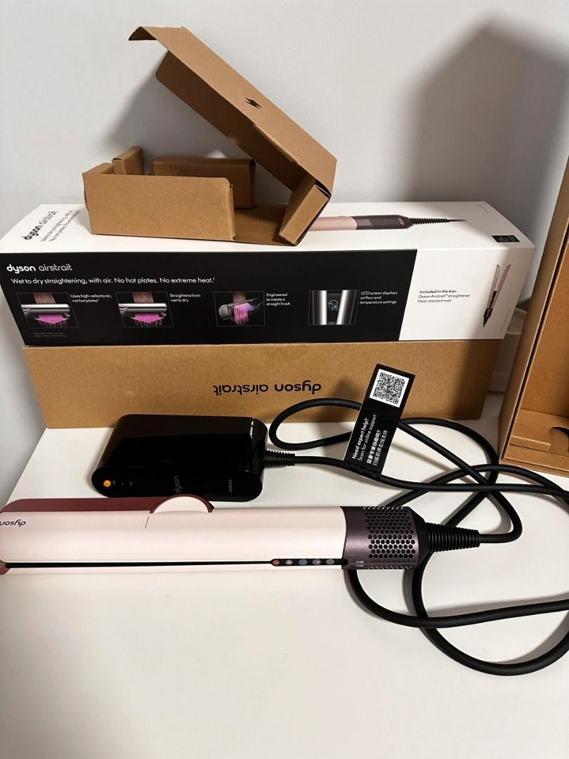 Dyson Airstrait Straightener Ceramic Pop HT01 (Category: Hair) located in Las Pinas. Submitted by raremountain-e7fc4f (Listing ID 1468351625, Image 1). Description: - Authentic Dyson Airstrait in Strawberry Bronze & Blush Pink - Wet-to-dry styling powered by air (no hot plates) - Zero heat damage technology for healthy hair - Tested and in perfect working condition - Includes original cardboard box and matching storage mat - Grab this amazing dea