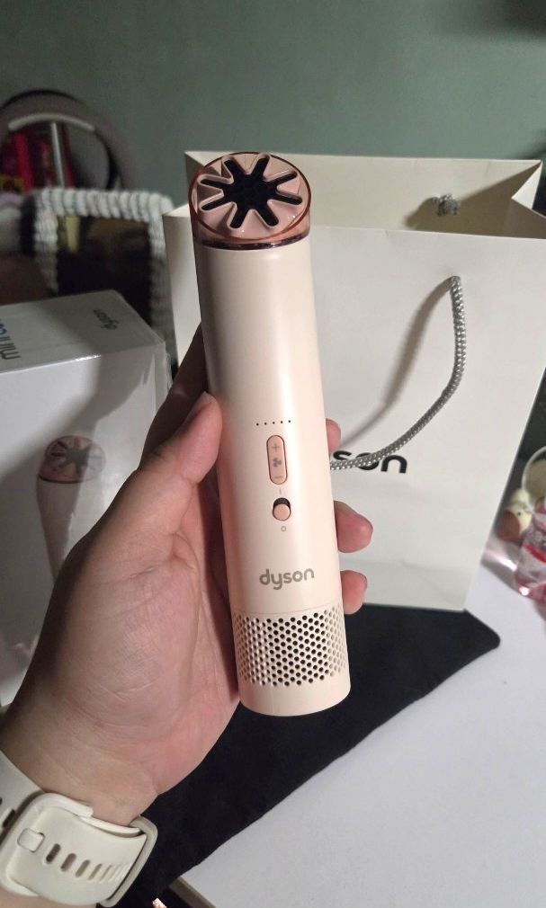 Dyson Hushjet Mini Cool Portable Fan pink (Category: Fans) located in Valenzuela. Submitted by heybuythiss (Listing ID 1468192694, Image 2). Description: ‼️READ DESCRIPTION‼️ bought october 13, 2026 at Dyson trinoma Slightly used SRP 6,499PHP - Color: pink - Condition: Clean and fully working - Power: USB-C rechargeable (cable not included) - Features: Adjustable speed settings via handle buttons - Portability: Compact size, perfect for travel or