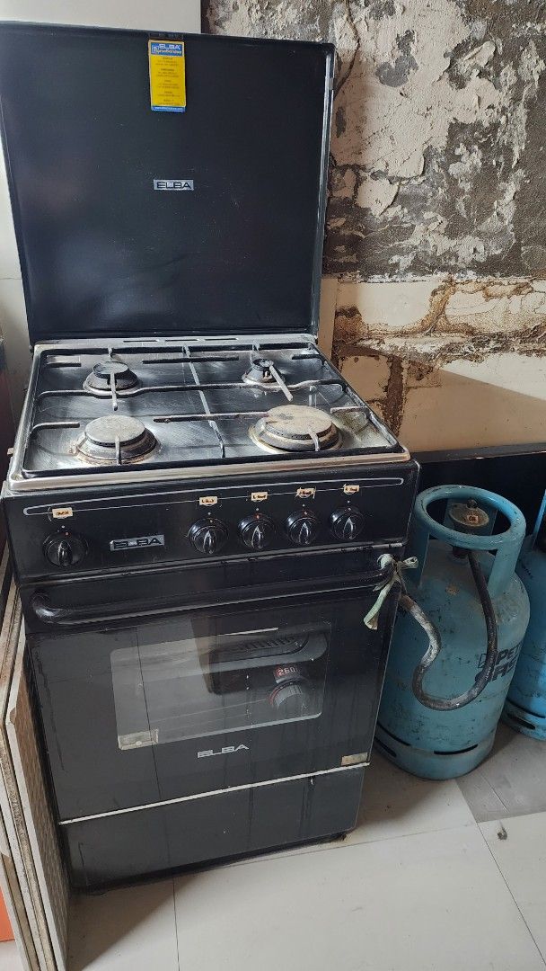 Elba Gas Stove with Oven (Category: Cookers) located in Quezon City. Submitted by christyso1209 (Listing ID 1468403462, Image 2). Description: - Brand/Model: Elba Gas Cooker - Color: Sleek Black - Burners: 4 gas burners for simultaneous cooking - Oven: Built-in oven underneath with a glass viewing window - Controls: Easy-to-use front panel control knobs - Condition: Used, well-maintained, and fully functional - Note: Compatible with standard gas 