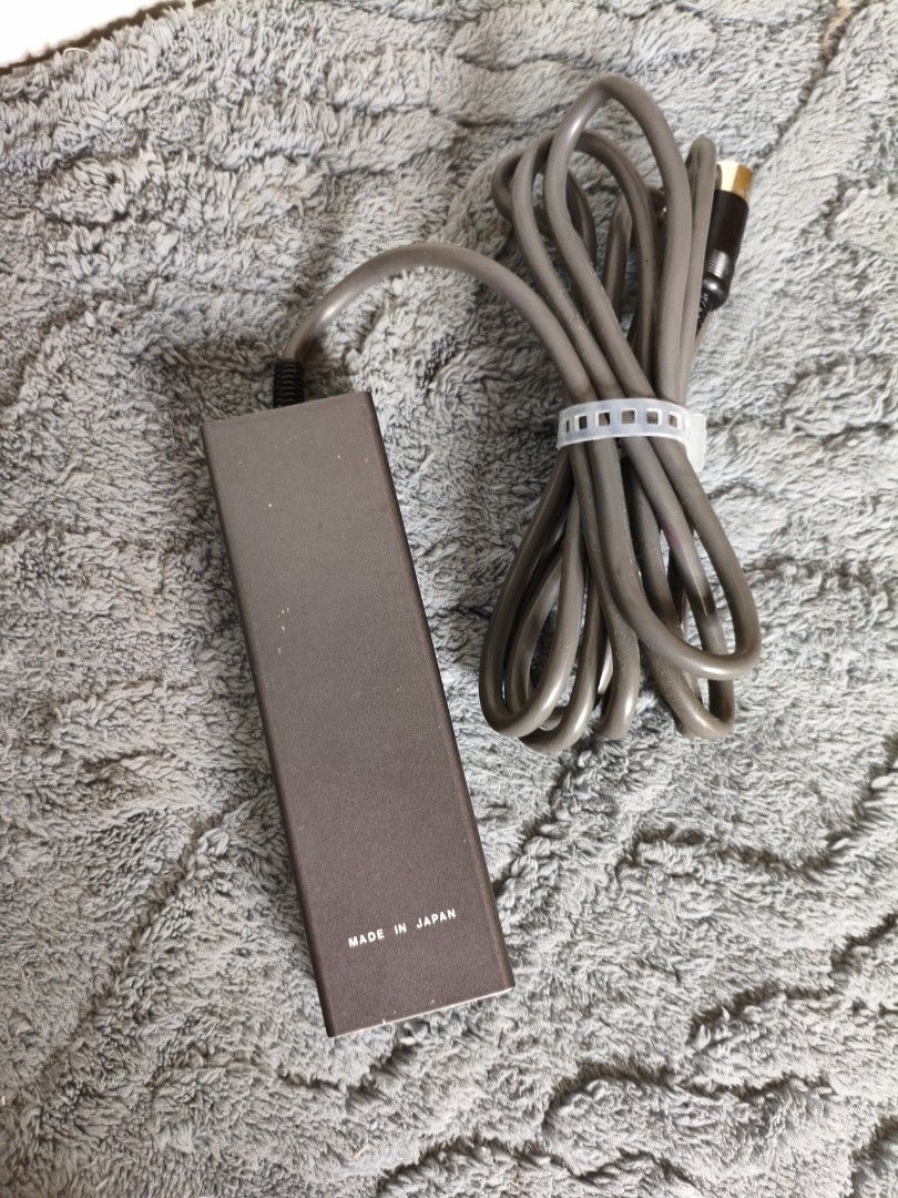 Elmo GS-1200 Remote Controller (Category: Controllers) located in Lubao. Submitted by aczcollectibles (Listing ID 1468350808, Image 2). Description: Original Elmo GS-1200 remote controller for projector setups. Includes attached cable with multi-pin connector. Controls record, reverse, off, and forward functions. Made in Japan. Vintage accessory for film projector enthusiasts..