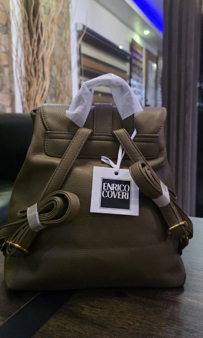 Enrico Coveri leather backbag (Category: Luxury Bags & Wallets) located in Apalit. Submitted by mjtwicedstyle_de_ap (Listing ID 1468330242, Image 3). Description: Brandnew with Tag Enrico Coveri from Italy. soft lrather medium size with taupe/brownish color.