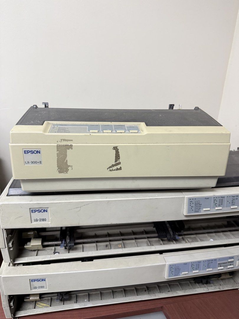 Epson LX-300+II and LQ-2180 Dot Matrix Printers Bundle (Category: Printers, Scanners & Copiers) located in Antipolo. Submitted by nil.nil1 (Listing ID 1468286779, Image 3). Description: - Bundle includes: 2x Epson LX-300+II and 2x Epson LQ-2180 dot matrix printers - Heavy-duty printing technology equipped with standard parallel and serial ports - Ideal for office spare parts, vintage computing projects, or continuous stationery printing - Cosmeti