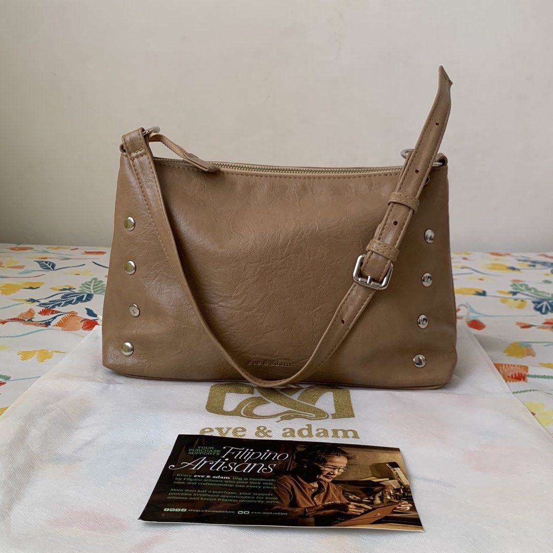 Eve & Adam Lia Studded Hobo Bag - Latte (Category: Shoulder Bags) located in Calamba. Submitted by capriciousss (Listing ID 1468305892, Image 2). Description: eve & adam lia studded hobo bag color: latte dimensions in inches: 12x4.25x8 with dust bag got it for P1,450 just recently no issues, barely used really good quality from a local brand in marikina soft leather material has studs padded bottom so it easily stands on surface adjustable strap 