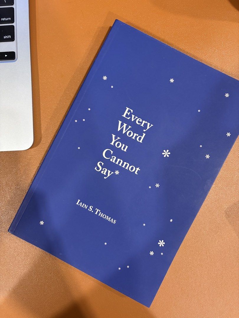 Every Word You Cannot Say by Iain S. Thomas (Category: Storybooks) located in Cebu City. Submitted by gwyiener (Listing ID 1468462368, Image 1). Description: - Author: Iain S. Thomas (Andrews McMeel Publishing) - Format: Blue softcover with star and floral graphics - ISBN: 978-1-4494-9520-6 - Content: Contemporary poetry and illustrations about love, grief, and healing - Condition: Read once, clean pages, with very minimal shelf wear on corners.