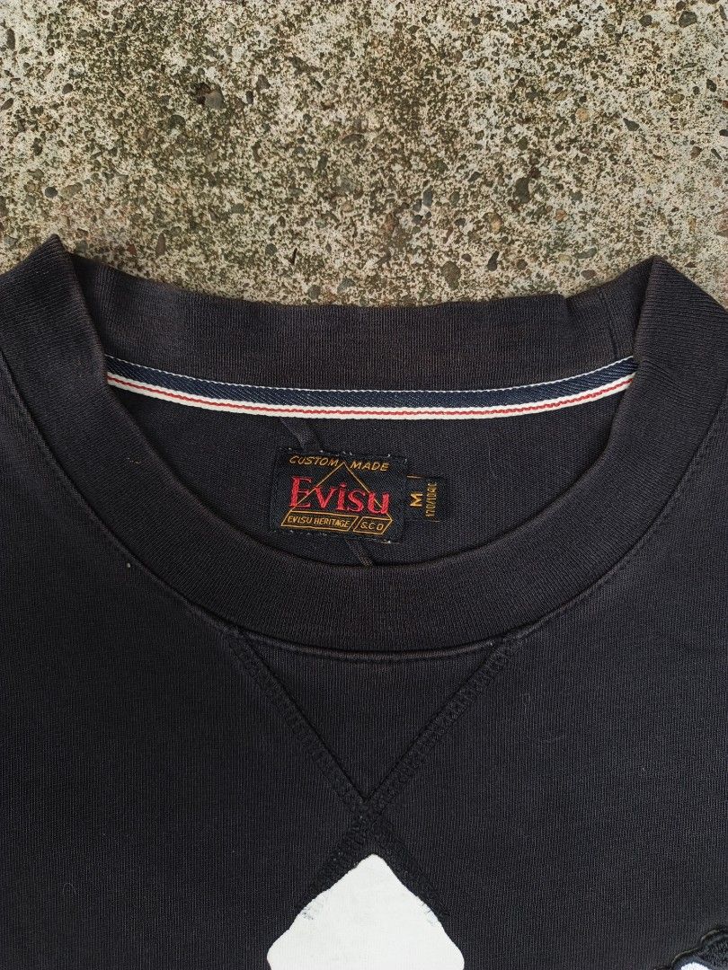 Evisu Heritage Shirt (Category: Tshirts & Polo Shirts ) located in Laguindingan. Submitted by lootsbyberle (Listing ID 1468430901, Image 3). Description: 19x29 Fit to Medium Evisu Hard Tag 🔥 Bacon and minimal discoloration on neckline, hairline/crack on print MOP:GCASH NO COD, NO FREE SHIP POLICY.