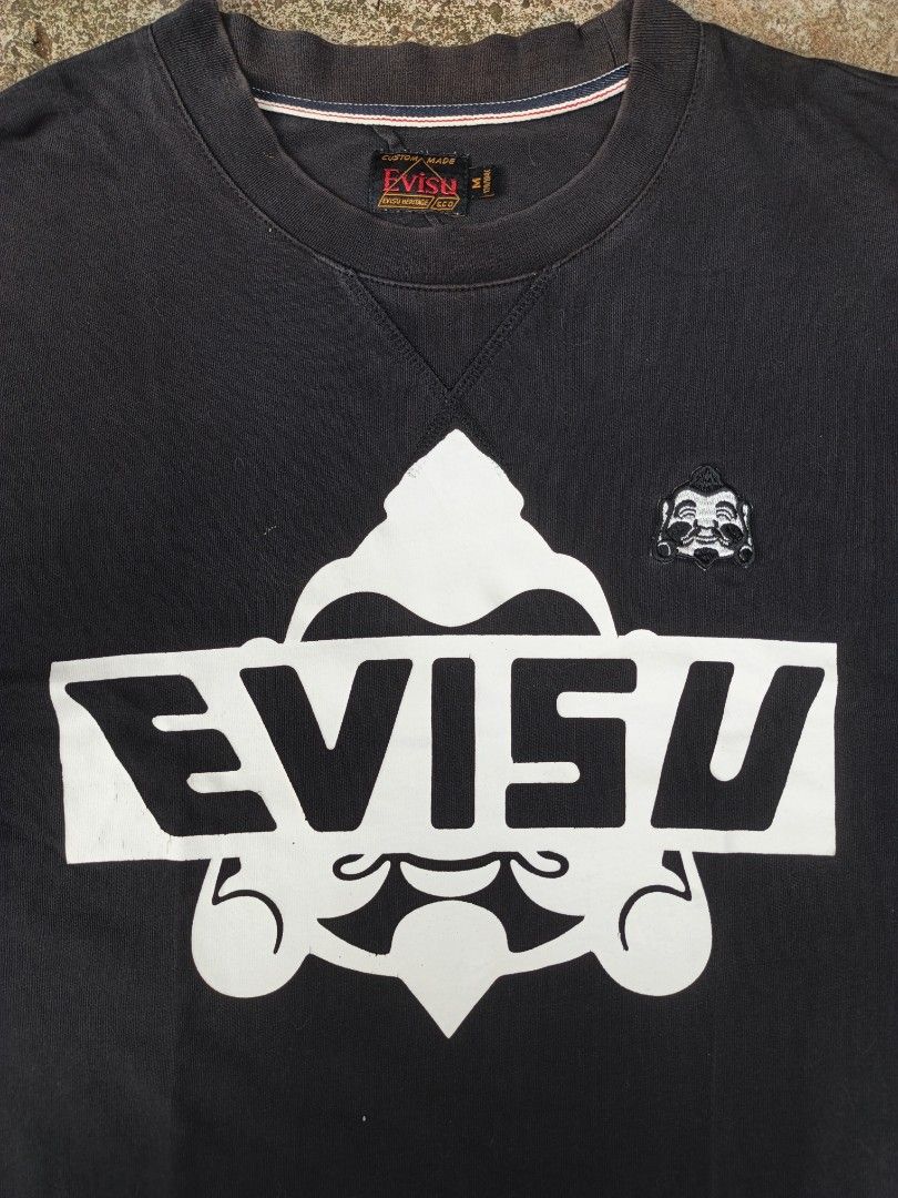 Evisu Heritage Shirt (Category: Tshirts & Polo Shirts ) located in Laguindingan. Submitted by lootsbyberle (Listing ID 1468430901, Image 2). Description: 19x29 Fit to Medium Evisu Hard Tag 🔥 Bacon and minimal discoloration on neckline, hairline/crack on print MOP:GCASH NO COD, NO FREE SHIP POLICY.