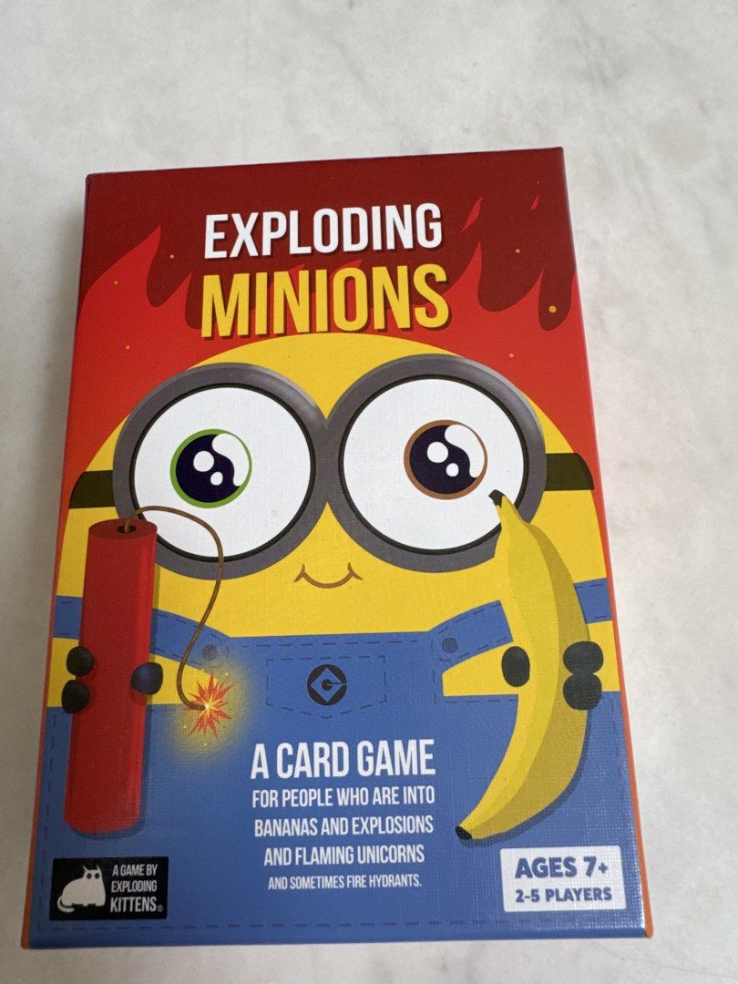 Exploding Minions Card Game by Exploding Kittens (Category: Board Games & Puzzles) located in Singapore. Submitted by doodlepie (Listing ID 1468320834, Image 1). Description: Exploding Minions card game by Exploding Kittens. Perfect for 2-5 players aged 7 and up. Features fun Minions characters with classic gameplay..