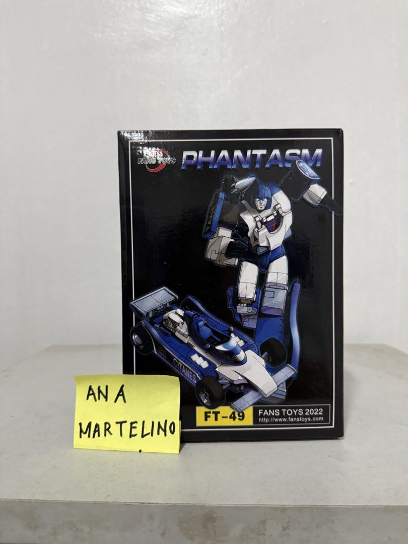 Fans Toys FT-49 Phantasm Transformers Masterpiece (Category: Figurines & Statues) located in Manila. Submitted by ana_banana011 (Listing ID 1468301365, Image 1). Description: - Brand: Fans Toys (FT-49 Phantasm) - Condition: Mint in box with original packaging, artwork, and character bio - Scale: Masterpiece scale collector figure - Mode: Fully converts between robot mode and detailed blue race car mode - Accessories: Includes interchangeable head