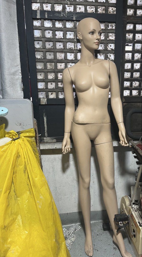 Female Bald Mannequin Display Dummy (Category: Blouses) located in Manila. Submitted by coco2212 (Listing ID 1468320076, Image 1). Description: Full body female mannequin with a bald head and neutral skin tone. Stands upright with realistic proportions. Shows minor scuffs around the waistline and feet from storage. Great for clothing displays, boutique setups, or art projects. Sturdy build, detaches at the waist and limbs for easy transport. 0956