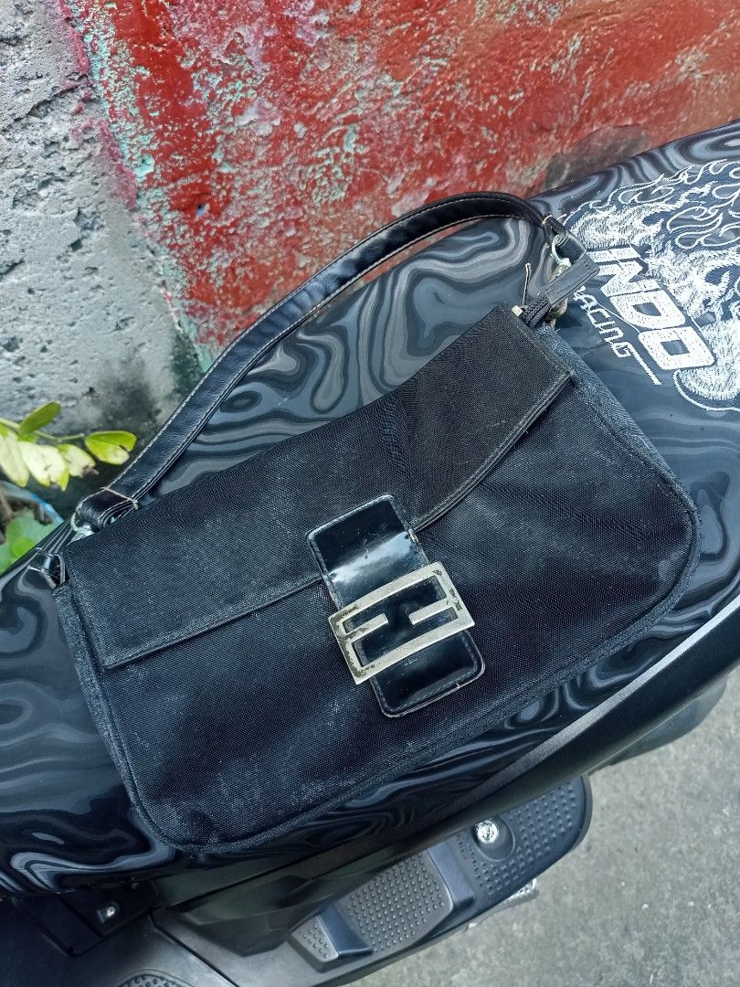 Fendi bag (Category: Luxury Bags & Wallets) located in Manila. Submitted by kenny200024 (Listing ID 1468424803, Image 1). Description: Fendi bag - in good condition - have flaws / issues sign of usage - DM will send you other details.