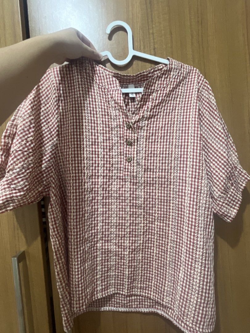 F&F Red Gingham Check Button Blouse Top (Category: Blouses) located in Tabaco. Submitted by mcsizzlinghottocino (Listing ID 1468425830, Image 1). Description: - Brand: F&F - Design: Red and white gingham check with embroidered vertical stripes - Fit: Relaxed, lightweight, and comfortable - Neckline: V-neck with small button placket - Sleeves: Short sleeves - Condition: Excellent / Great for casual everyday wear - Mode of Payment: BPI / GCash / CO