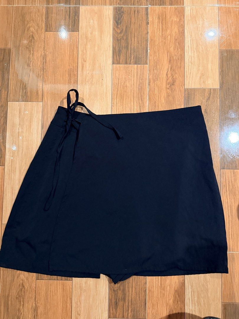 Fifty Percent Black Wrap Skorts Size L (Category: Skirts) located in Quezon City. Submitted by shopalmostfriday (Listing ID 1468316548, Image 1). Description: - Brand: Fifty Percent - Condition: Brand new with tag attached (Size L) - Color: Black - Has Built in shorts - Fits 28-29 waist .