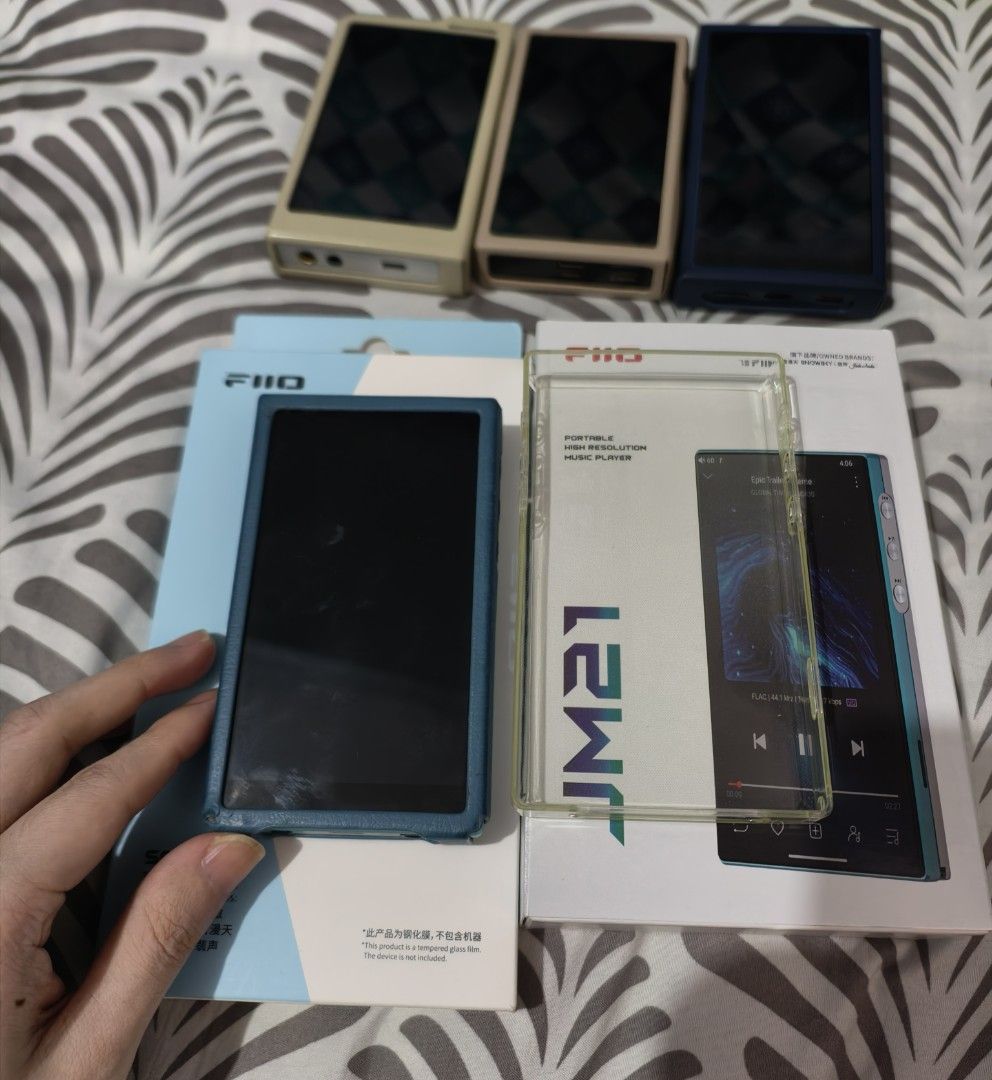 Fiio JM21 Audiophile DAP (Category: Portable Music Players) located in Bulacan. Submitted by casperchiu2798 (Listing ID 1468324385, Image 2). Description: Fiio JM21 - no issue - Condition: 8.5/10 may small dent sa lower corner check pics, scratches sa screen protector, may extra screen protector. - Inclusions: box, charging cable, extra screen protector, transparent case and leather case - Updated to latest version - free extra 64gb sd card pwede