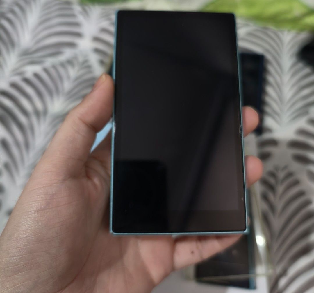 Fiio JM21 Audiophile DAP (Category: Portable Music Players) located in Bulacan. Submitted by casperchiu2798 (Listing ID 1468324385, Image 3). Description: Fiio JM21 - no issue - Condition: 8.5/10 may small dent sa lower corner check pics, scratches sa screen protector, may extra screen protector. - Inclusions: box, charging cable, extra screen protector, transparent case and leather case - Updated to latest version - free extra 64gb sd card pwede