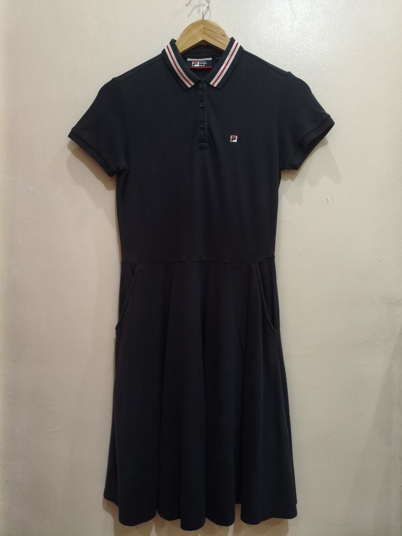Fila Black Polo Dress (Category: Dresses) located in Mandaluyong City. Submitted by frivsthriftsph (Listing ID 1468453314, Image 1). Description: Fila Black Polo Dress Like new condition. Color rate is 9/10. Size M on tag. Actual dimes are 17W by 37L. No other issue aside from cut washtags..