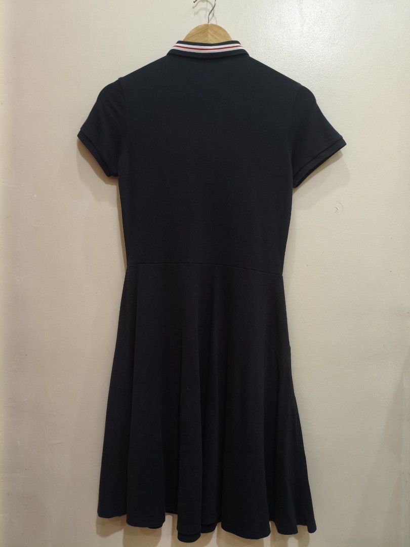Fila Black Polo Dress (Category: Dresses) located in Mandaluyong City. Submitted by frivsthriftsph (Listing ID 1468453314, Image 2). Description: Fila Black Polo Dress Like new condition. Color rate is 9/10. Size M on tag. Actual dimes are 17W by 37L. No other issue aside from cut washtags..