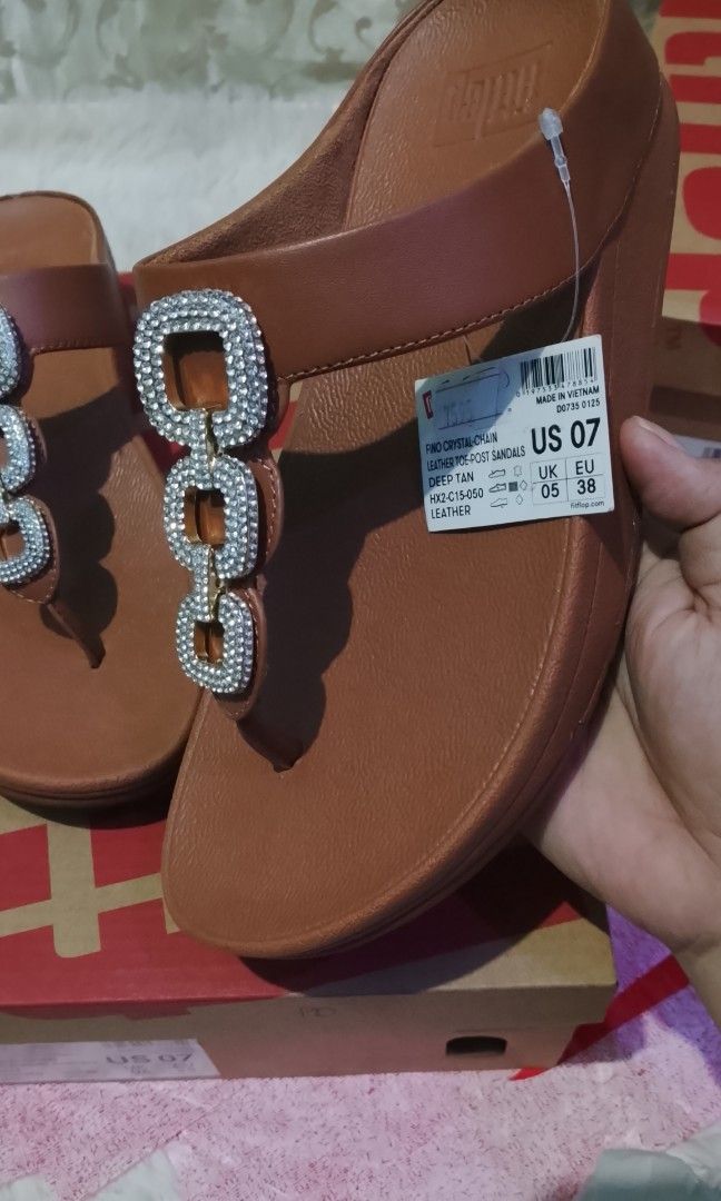 Fino crystal chain (Category: Sandals) located in Muntinlupa City. Submitted by jcualquera (Listing ID 1468474552, Image 2). Description: Fino crystal chain Leather toe post Sandal Deep tan US7 ONLY -2pair ✅ Onhand✅ Laspinas ✅💚.