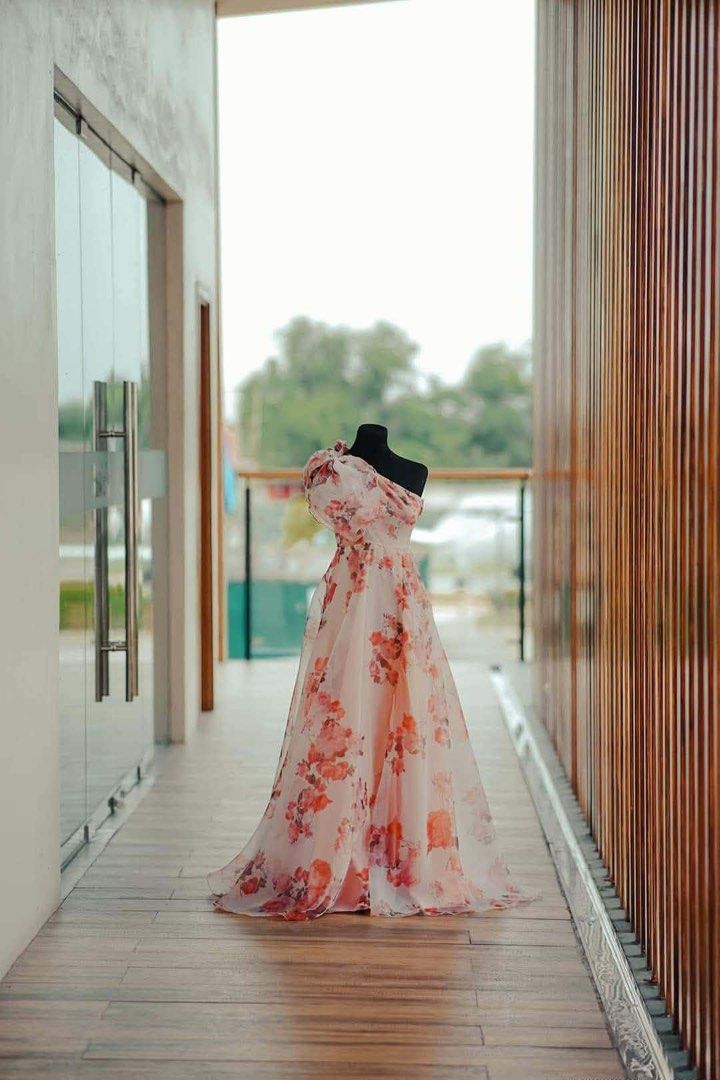 Floral gown (Category: Evening dresses & gowns) located in Baliuag. Submitted by sirc_28 (Listing ID 1468446030, Image 1). Description: This dress is the SHEIN Belle Asymmetrical Neck Knot Side Floral Dress. It is widely popular for formal events, prom, dinners, and wedding guest attire..