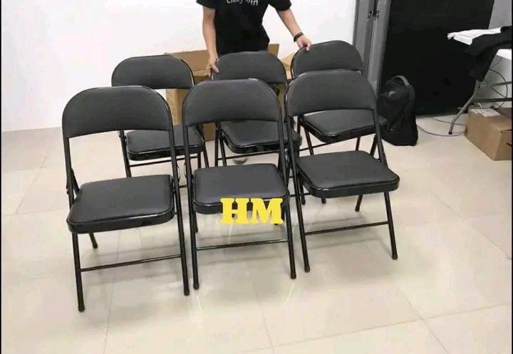 FOLDING CHAIR (Category: Chairs) located in Manila. Submitted by berdenmarl01688 (Listing ID 1468482465, Image 2). Description: - Black metal folding chairs - Padded seat and backrest for extra comfort - Sturdy and durable frame construction - Easy to fold flat for convenient storage and transport - Ideal for events, office use, home, or meetings - Clean overall condition - Price per piece (send a message for multiple chairs).