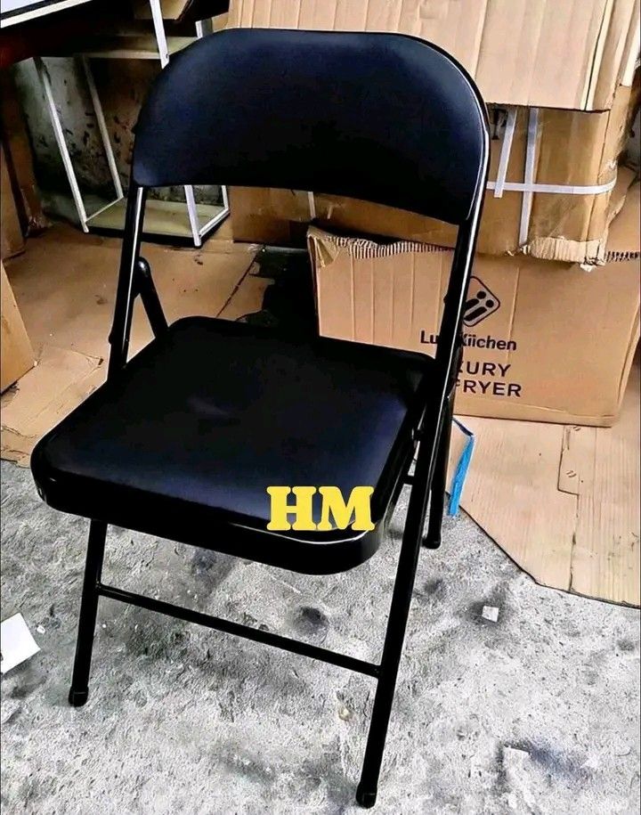 FOLDING CHAIR (Category: Chairs) located in Manila. Submitted by berdenmarl01688 (Listing ID 1468482465, Image 1). Description: - Black metal folding chairs - Padded seat and backrest for extra comfort - Sturdy and durable frame construction - Easy to fold flat for convenient storage and transport - Ideal for events, office use, home, or meetings - Clean overall condition - Price per piece (send a message for multiple chairs).