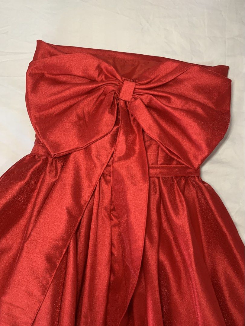 [FOR RENT] Red Ball Gown with Bow (Category: Evening dresses & gowns) located in Quezon City. Submitted by jsjaemdeclutter (Listing ID 1468325493, Image 3). Description: - ₱500 for security deposit (refundable) - perfect for prom, gradball, or any formal events! - birthday debut gown - fits small - medium - dm for measurements and more photos.