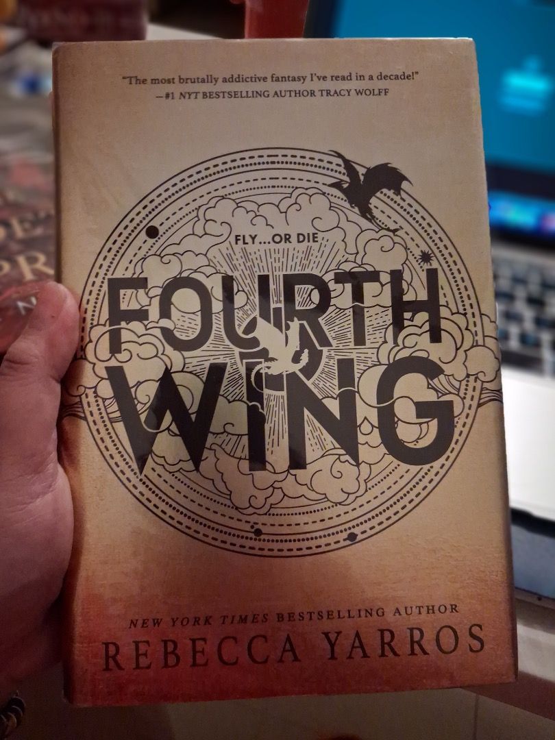 Fourth Wing Book Entangled Publishing (Category: Storybooks) located in Cebu City. Submitted by bettzy77 (Listing ID 1468480643, Image 1). Description: - Format: Hardcover fantasy novel (ISBN: 9781649374042) - Condition: Brand new and sealed in original plastic wrapping - Price Tags: Original printed prices ($29.99 USD / $34.99 CAD) with Fully Booked store price sticker of ₱1,595 attached - Special Details: Dragon rider quote printed on the top b