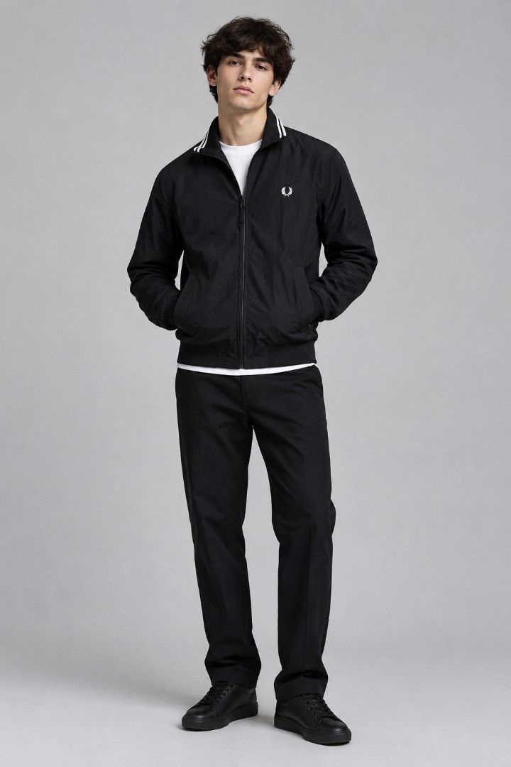 Fred Perry Black Bomber Jacket (Category: Coats, Jackets and Outerwear) located in Manila. Submitted by niggzreyno51476 (Listing ID 1468378543, Image 1). Description: - Brand: Fred Perry - Style: Zip-up bomber jacket - Color: Black - Size: XS - Details: Double-tipped collar detailing and embroidered laurel wreath logo on the chest - Origin: Made in Vietnam - Condition: Inner care and brand tags attached, includes red security tag - Classic casual