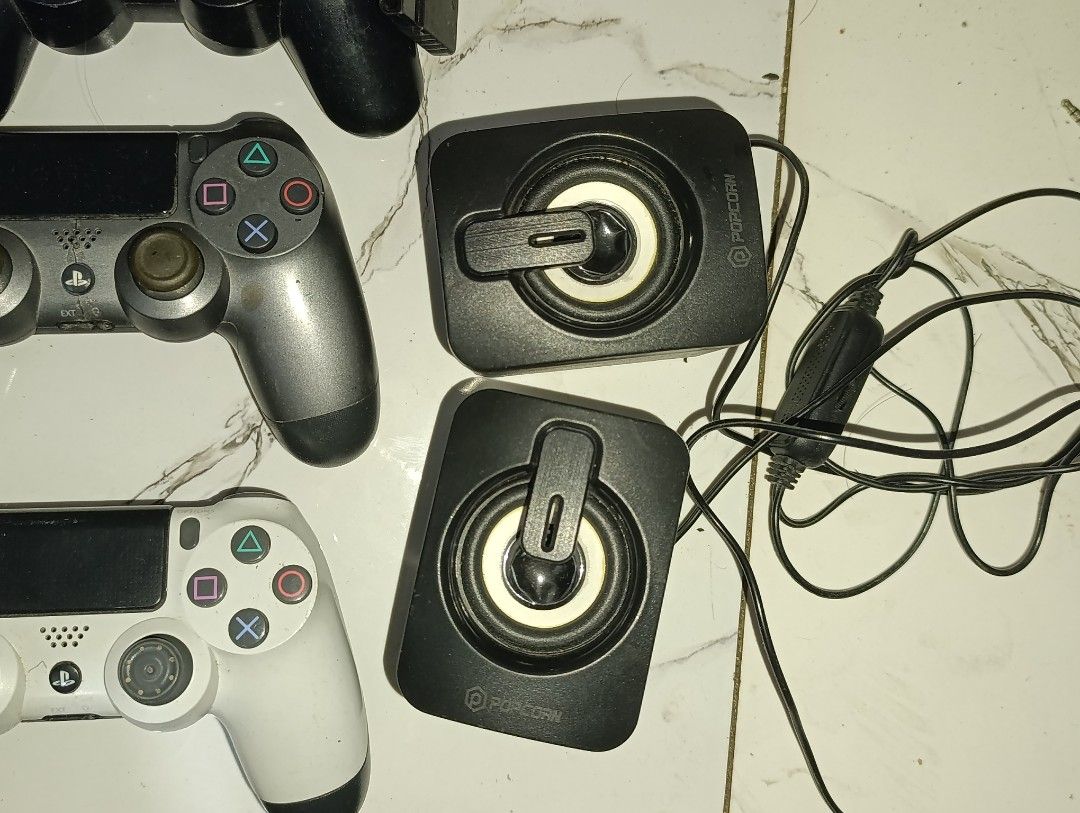 declutter take all PS4/PS3/PS2 controller, speaker, laptop keyboard (Category: Computer Parts) located in Naga. Submitted by brightsideofthemoon (Listing ID 1468350440, Image 2). Description: confirmed working Yung PS4 controllers and speaker po. 1k take all. just decluttering items.