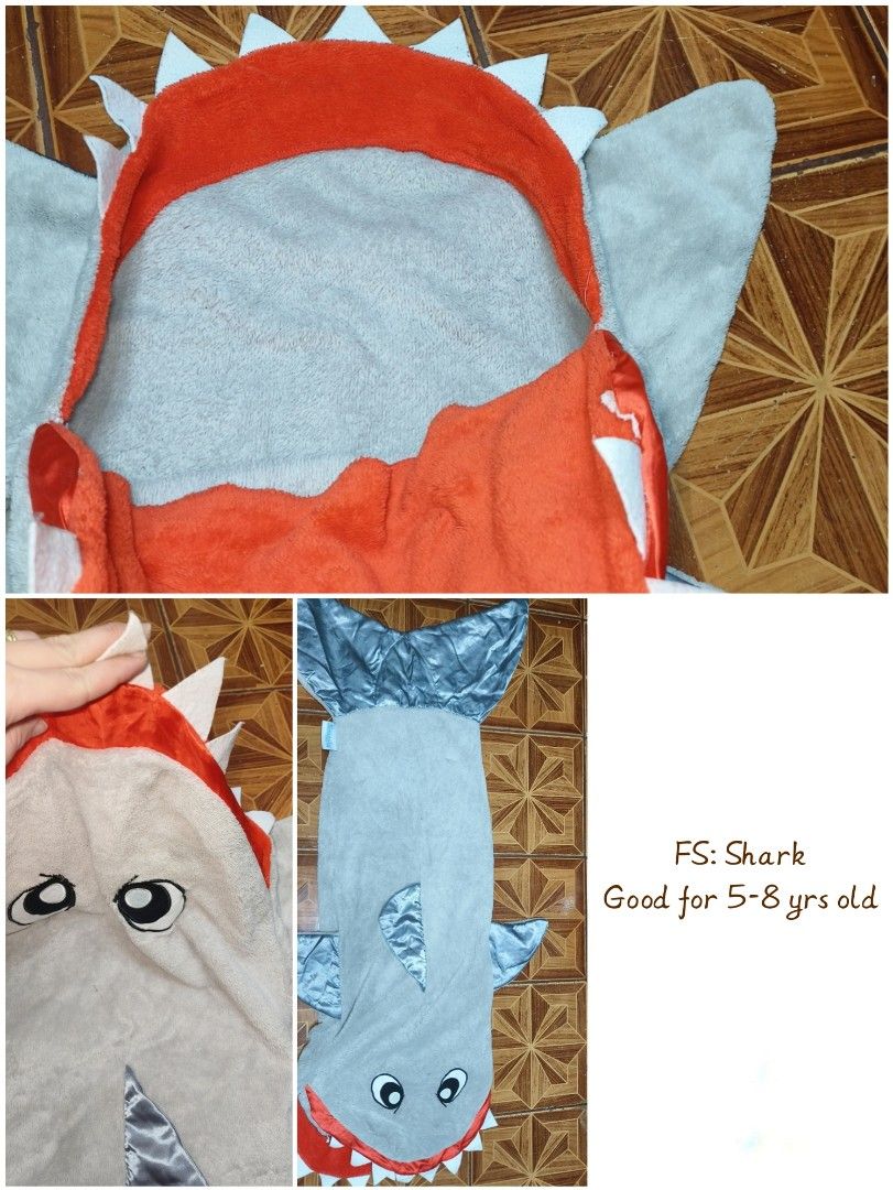 FS Shark wearable blanket for 5-8 yrs old (Category: Babies & Kids Fashion) located in Manila. Submitted by jewfindshop (Listing ID 1468340938, Image 1). Description: - Adorable shark wearable blanket for kids aged 5 to 8 years old - Made from ultra-soft and cozy light grey fleece material - Features a fun bright orange inner mouth with white felt teeth - Complete with eye-catching shiny silver fins and tail - Versatile hoodie style, perfect for 