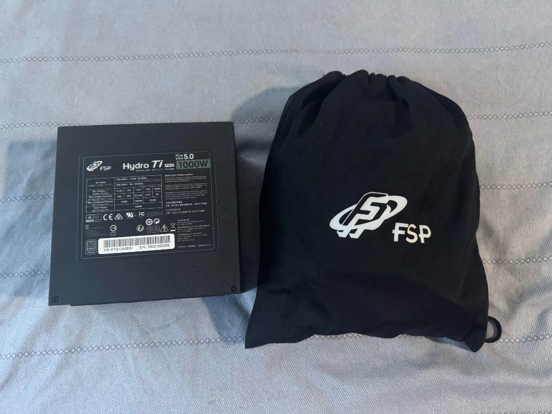 FSP Hydro Ti PRO 1000W Power Supply (Category: Computer Parts) located in Taguig. Submitted by sait0u (Listing ID 1468357482, Image 1). Description: - Model: FSP Hydro Ti PRO 1000W Power Supply Unit - Standard: ATX 3.0 & PCIe 5.0 ready for high-end builds - Inclusion: Original FSP black storage pouch for cables - Condition: Clean, well-maintained, and ready to use - Bought June 2023.