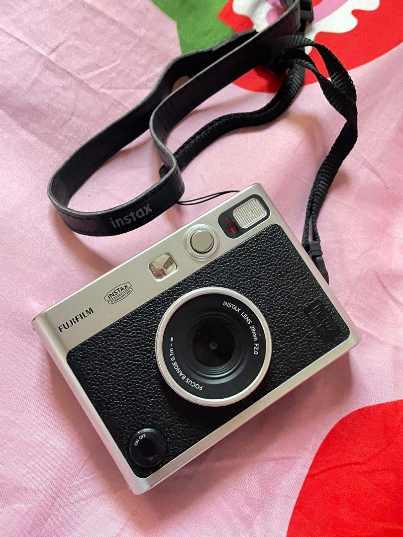 FUJI FILM MINI EVO (Category: Cameras) located in Manila. Submitted by annievey (Listing ID 1468444563, Image 1). Description: FS ❕ FS ❕ FS ❕ FS ❕ Instax mini evo fuji film (black) Original price: 12,999 Price fs: 10,500 — negotiable for sure buyer 🥺🥺 No functional issue, may mga minimal scratch lang sa malapitan lang sya visible 😄 all goods pa talaga, almost a year and a half months palang sakin. Inclusion: camera, lace, box and 30gb SD card 