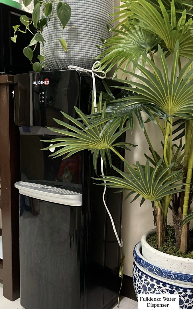 Fujidenzo Water Dispenser (Category: Water Purifiers & Dispensers) located in Manila. Submitted by danosaurrr (Listing ID 1468302862, Image 1). Description: 💧 FUJIDENZO FWD1031B WATER DISPENSER FOR SALE! 💰 Price: ₱2,500 Black, free-standing, top-load water dispenser with 3 water options: Hot, Cold, and Warm! Features an energy-efficient compressor, child safety lock for hot water, and double safety protection against overheating.