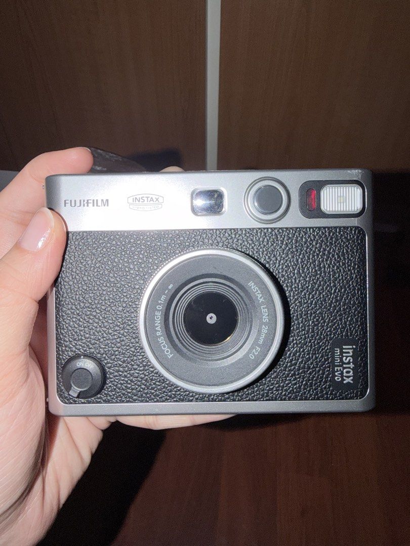 Fujifilm Instax Mini Evo Hybrid Instant Camera (Category: Cameras) located in Pasig City. Submitted by destash14 (Listing ID 1454794884, Image 2). Description: Fujifilm Instax Mini Evo Hybrid Instant Camera With viewfinder Complete with box and cable No issue.