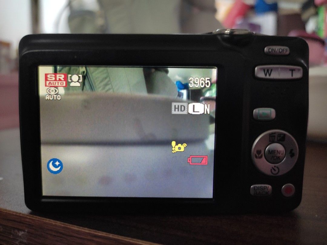 Fujifilm JX500 digital camera (Category: Cameras) located in Bacoor. Submitted by Exedriae (Listing ID 1468321911, Image 3). Description: 📸 FUJIFILM JX500 ✨ • Sensor: 14-megapixel 1/2.3-inch CCD sensor • Lens: 5x optical zoom • Screen: 2.7-inch fixed TFT LCD screen •Video: 720p HD video recording at 30 fps (Motion JPEG with mono audio) •Uses an NP-45A lithium-ion battery •Compatible with SD, SDHC, and SDXC memory cards •Face Detection, Blink Det