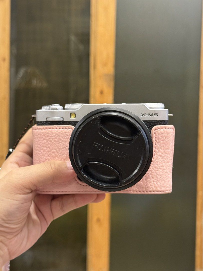Fujifilm X-M5 15-45mm Kit Silver (Category: Cameras) located in Manila. Submitted by julliarose41494 (Listing ID 1468300885, Image 3). Description: - Fujifilm X-M5 Camera Kit (Silver) with 15-45mm Lens - Purchased last November 30, 2025 at Photoline (Receipt and official warranty included) - Pristine condition, 100% working and ready to shoot - Complete with original box - FREE Accessories: Black camera bag, stylish pink half case, pink rhineston