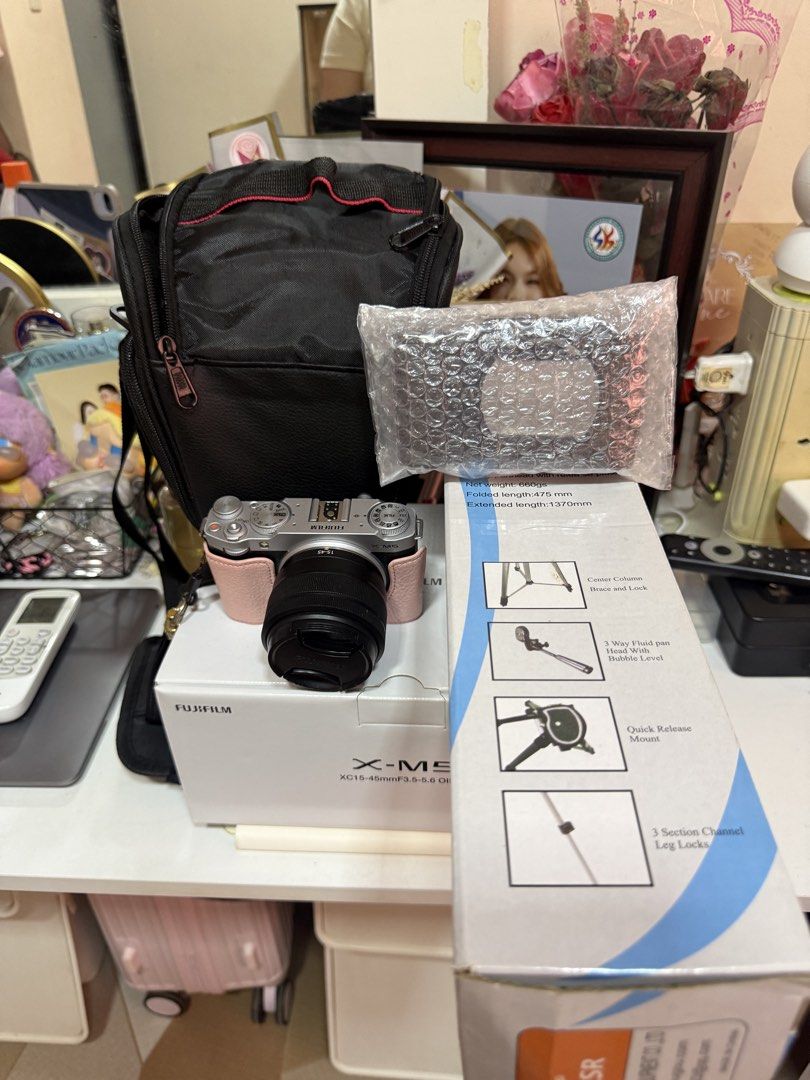 Fujifilm X-M5 15-45mm Kit Silver (Category: Cameras) located in Manila. Submitted by julliarose41494 (Listing ID 1468300885, Image 1). Description: - Fujifilm X-M5 Camera Kit (Silver) with 15-45mm Lens - Purchased last November 30, 2025 at Photoline (Receipt and official warranty included) - Pristine condition, 100% working and ready to shoot - Complete with original box - FREE Accessories: Black camera bag, stylish pink half case, pink rhineston
