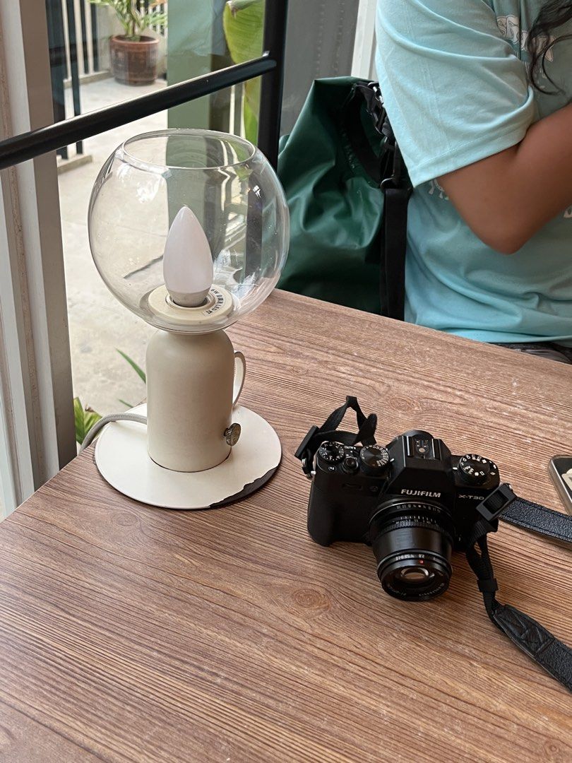 Fujifilm X-T30 Mirrorless Camera with Strap (Category: Cameras) located in Manila. Submitted by findalyeska (Listing ID 1468364458, Image 1). Description: - Camera Model: Fujifilm X-T30 (Black body) - Included: Xt30ii body, 35mm ttartisan, 16-55mm fujinon kitlens, 3 batteries (1 original, 2 k&f, 1 type c charger, black strap. - Design: Classic top dial controls - Ideal For: Street photography and everyday carry - Condition: Compact, lightweight, 