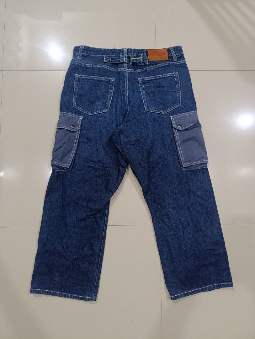 Full House Denim & Workshop Cargo Jeans (Category: Jeans) located in Davao. Submitted by idioticthrifter (Listing ID 1468465588, Image 2). Description: Dark blue denim cargo jeans from Full House Denim & Workshop. Button fly closure, back cinch adjuster, and utility pockets on both legs. Contrast white stitching and tan leather patch on the back waistband. Inside lining has printed graphic details. Heavyweight denim fabric. - Measurements: 34 wai