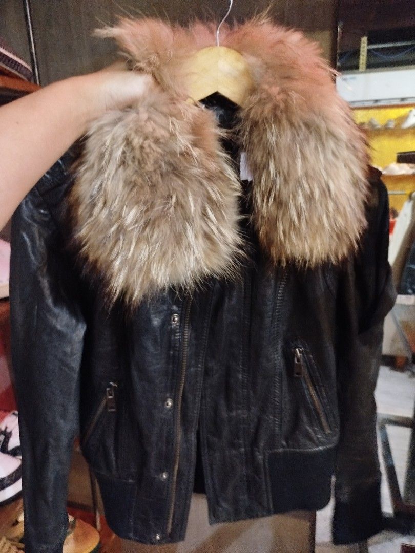 Fur Leather Black Coat (Category: Coats, Jackets and Outerwear) located in Quezon City. Submitted by cuteitemsonlyyy (Listing ID 1468414740, Image 2). Description: - Brand: Blues Heroes - Item: Fur Leather Black Coat / Jacket - Size: S (EU 36 / UK 8 / US 4) - Material: Genuine leather body with plush furry collar - Design: Full zip-up front, snap button closures, side zip pockets, and ribbed hem - Condition: Layered condition 4, well-maintained -
