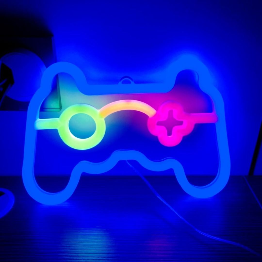 Game Controller LED Neon Light Wall Decorative Background (Category: Lighting) located in Taguig. Submitted by realmshop (Listing ID 1468311797, Image 1). Description: Game Controller LED Neon Light Wall Decorative Background LED Neon Sign Light Wall Decor | [Insert Design: Quote/Shape/Character] Neon Light Sign | USB-Powered Room Aesthetic Lighting | Bedroom, Living Room, Gaming Setup, Man Cave & Kids Room Decor | Perfect Gift for Teens, Gamers 
