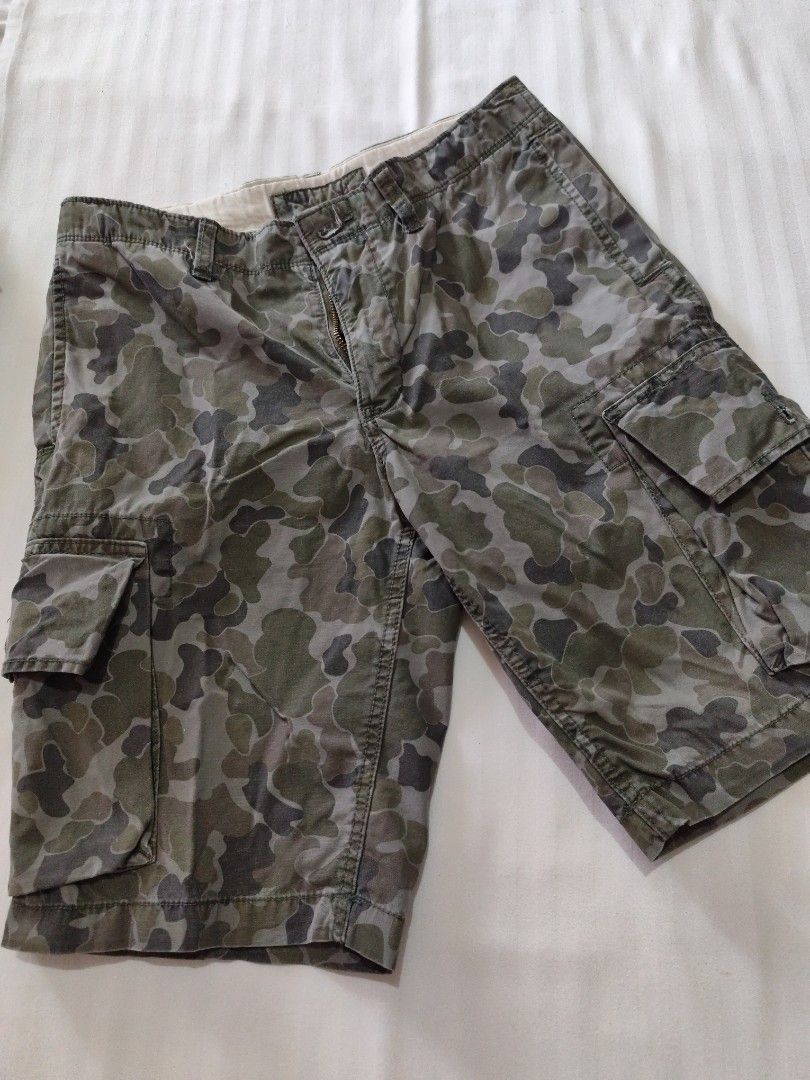 Gap Kids Camouflage Cargo Shorts Size 18 Regular (Category: Shorts) located in Malungon. Submitted by 2ndhandoriginals (Listing ID 1468302890, Image 1). Description: Waist: 39 inches Length: 19 inches - Brand: Gap Kids - Size: 18 Regular - Design: Green and grey all-over camouflage pattern - Pockets: Multiple functional side cargo pockets and back pockets - Closure: Button closure with a secure zipper fly - Adjustable waist garter.