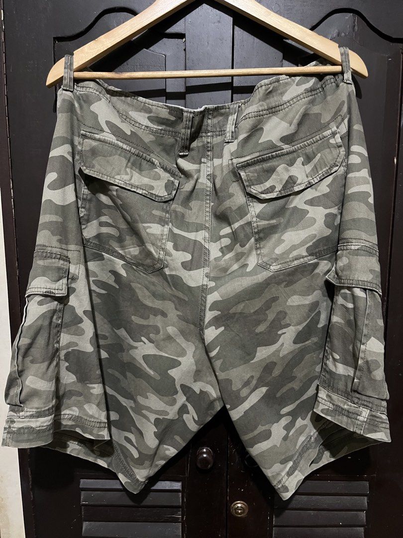 George Camo Six Pocket Utility Shorts (Category: Shorts) located in Santa Cruz. Submitted by wecareaboutthingswedonothave (Listing ID 1468478860, Image 2). Description: Waist - 44 Length - 21.5 Leg Opening - 14 Shipping will be shouldered by the buyer..